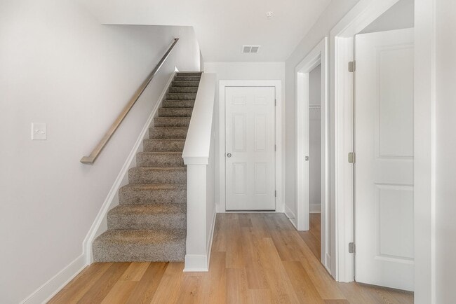 Building Photo - Modern 2025 Townhome | Open-Concept Living, Chef’s Kitchen with Large Island & 2-Car Garage