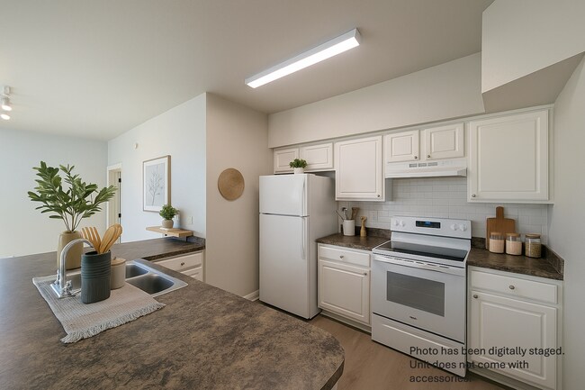 Building Photo - 2x2 New flooring throughout! Updated, spacious, comfortable with balconette!