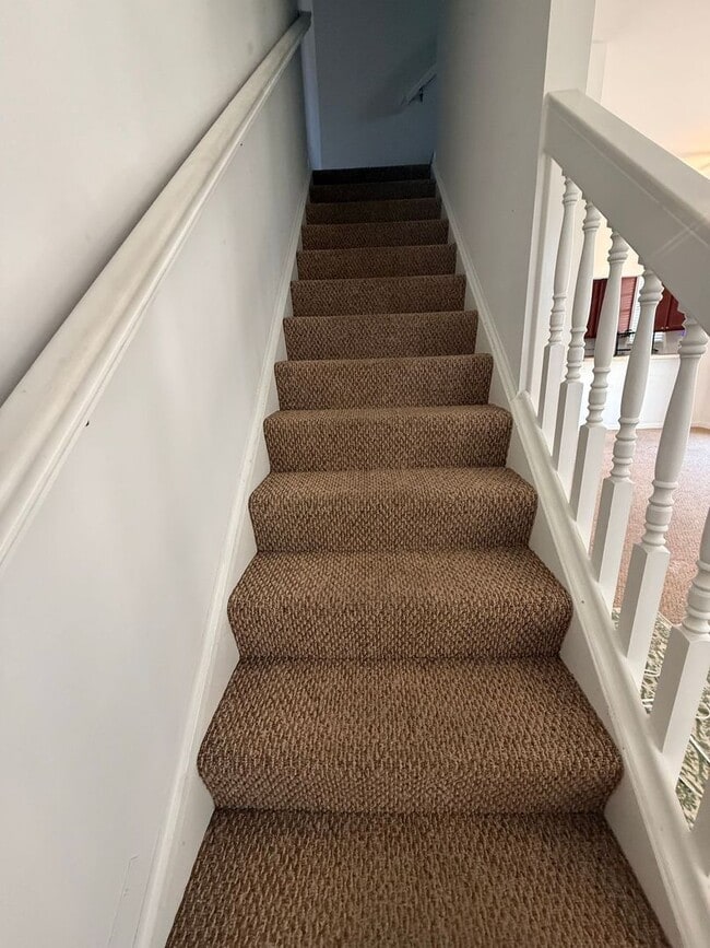 Building Photo - Spacious End-Unit Condo with Dual Primary Suites & Bonus Room