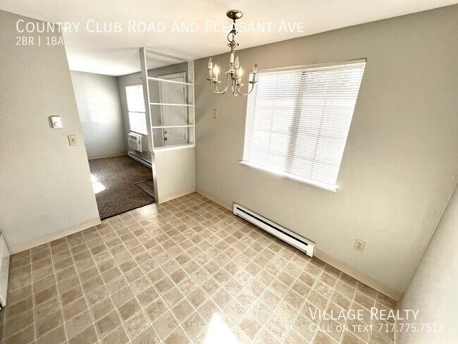 Building Photo - 605 Country Club Rd