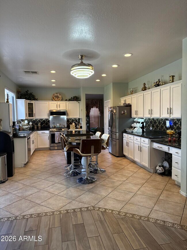 Building Photo - 3928 W Range Mule Dr