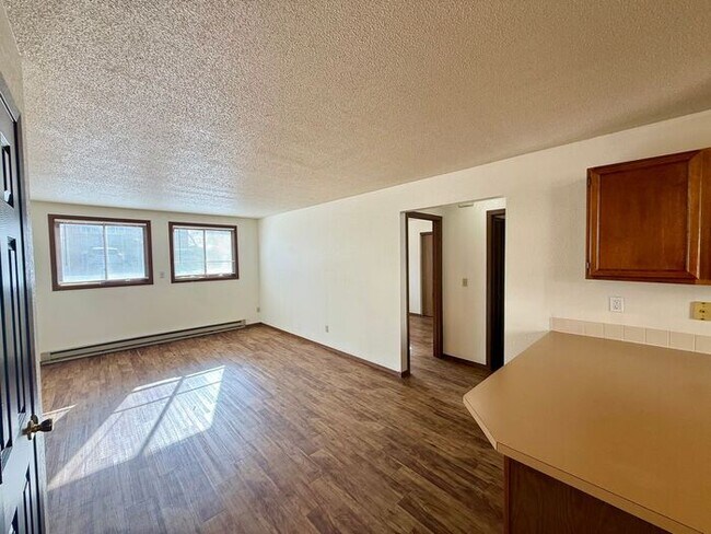 Building Photo - Cozy 2 Bed/1 Bath Apartment in North Loveland. New Wood Floors! RENT INCLUDES: Gas/Water/Sewer/Trash