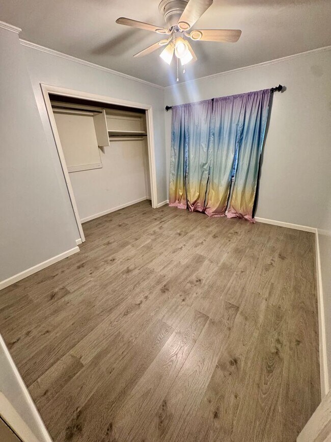 Building Photo - Beautiful corner lot. This home is very sp...