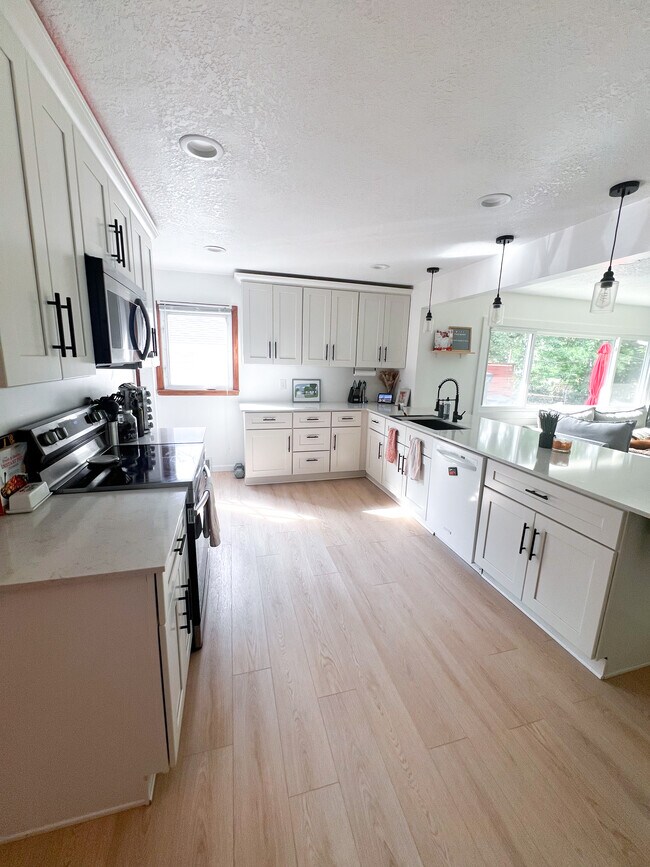 View of kitchen facings south (plenty of light) - 8434 Colfax Ave S