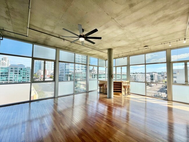 Building Photo - Stunning Corner Loft in East Village with Floor-to-Ceiling Windows & City Views!