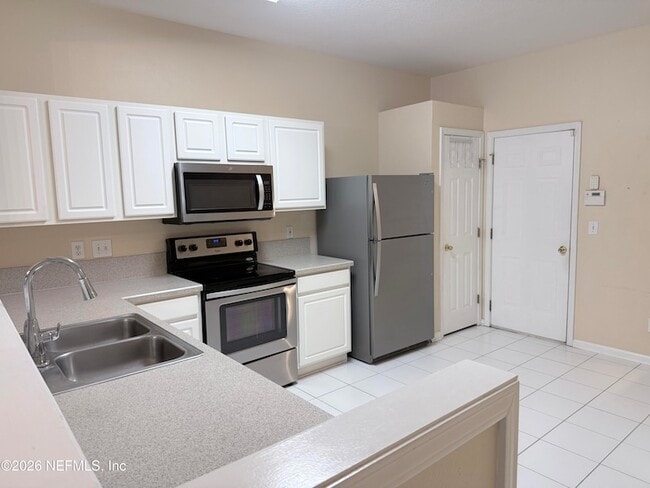 Building Photo - 7516 Scarlet Ibis Ln