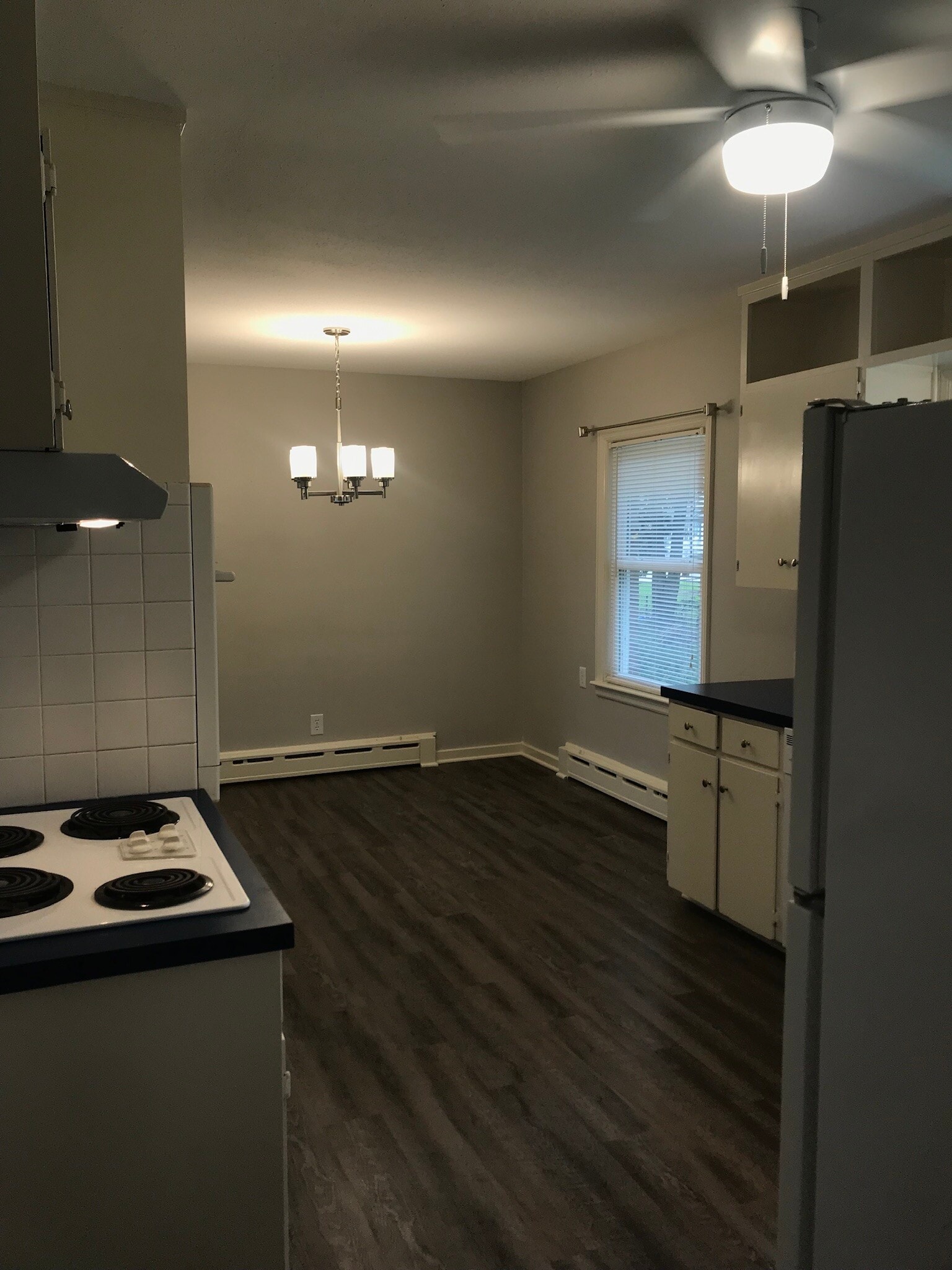 Eat-in kitchen (shown with old stove top) - 711 7th Ave
