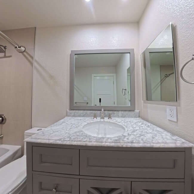 Building Photo - Highly Remodeled | Customer Closets | Gated Community