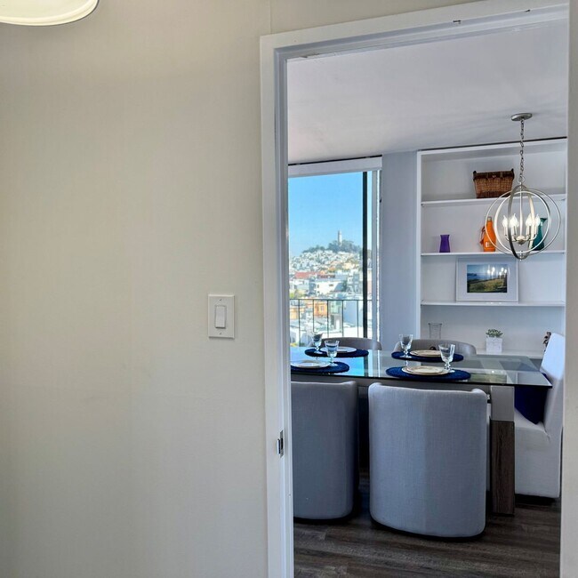 Building Photo - Just Unpack, Pour a Beverage, & Cue the Su...