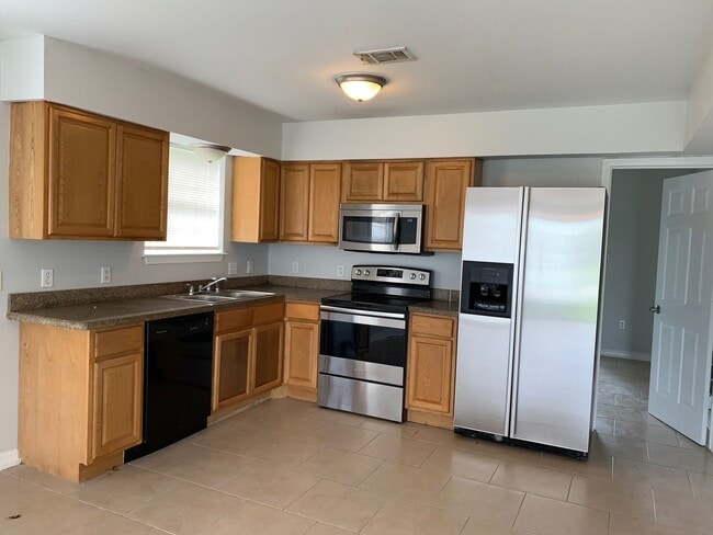 Building Photo - 8532-34 Deerfield Dr.