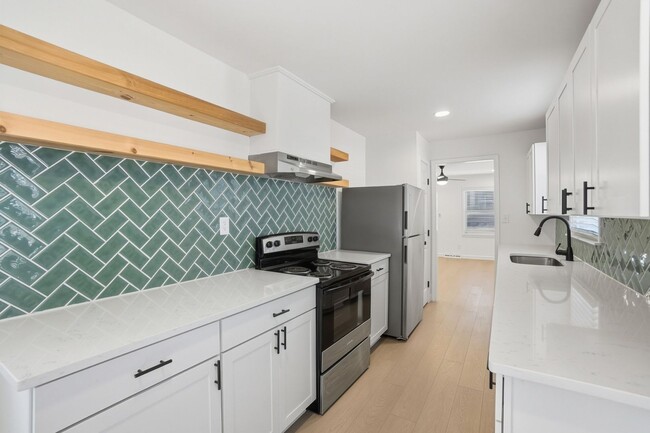 Building Photo - (Coming Soon) Beautifully Renovated 3-Bedroom with Fenced in Yard