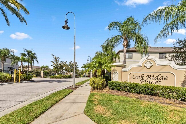 Building Photo - Bright & Stylish 3-Bedroom Townhome with Pond Views in Gated Seven Oaks