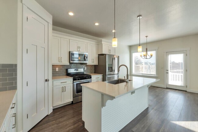 Building Photo - Modern Row End Townhome w 2 car attached g...
