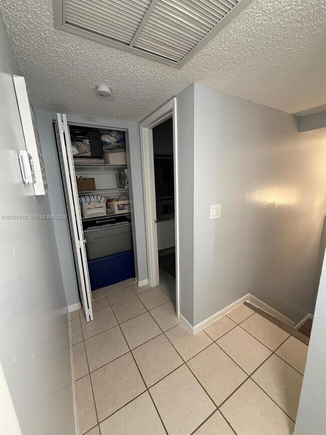 Building Photo - 6580 W 24th Ct