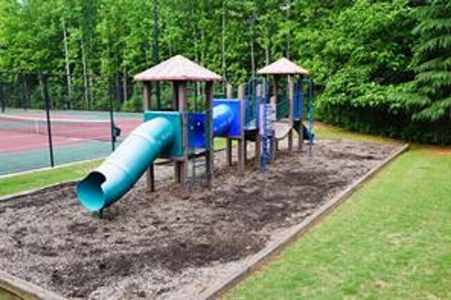 Building Photo - Gorgeous 3-Story Brick Home / 2 Fireplaces / Full Finished Basement / Chapel Hill Schools