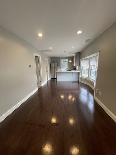 Open concept living room and kitchen - 4615 Bell St