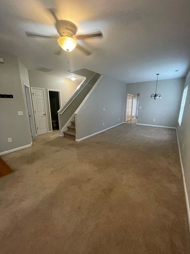 Building Photo - This two-story, 4-bedroom, 2-bath duplex in Fort Mill, SC sits on a corner lot