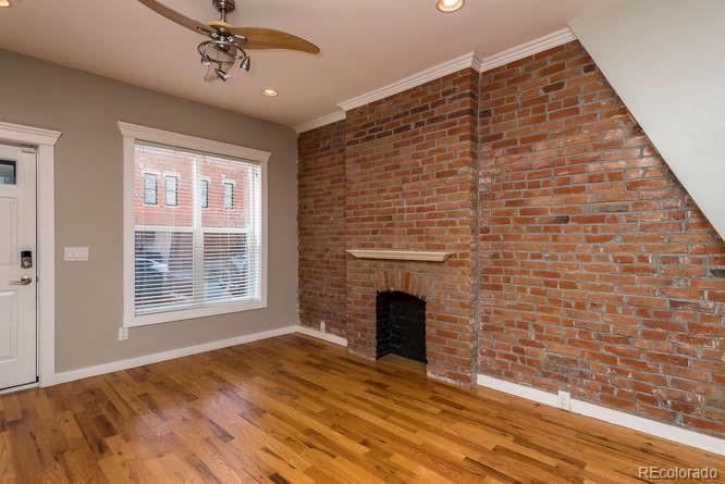 Big front window. (Fireplace is decorative only.) - 1231 31st St