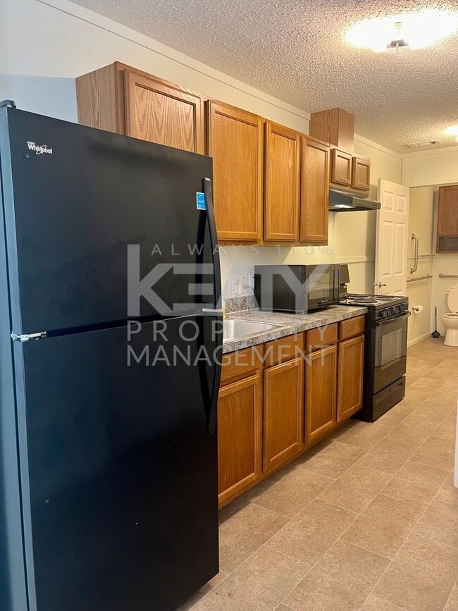 Building Photo - Charming home located in Grand Coteau, LA