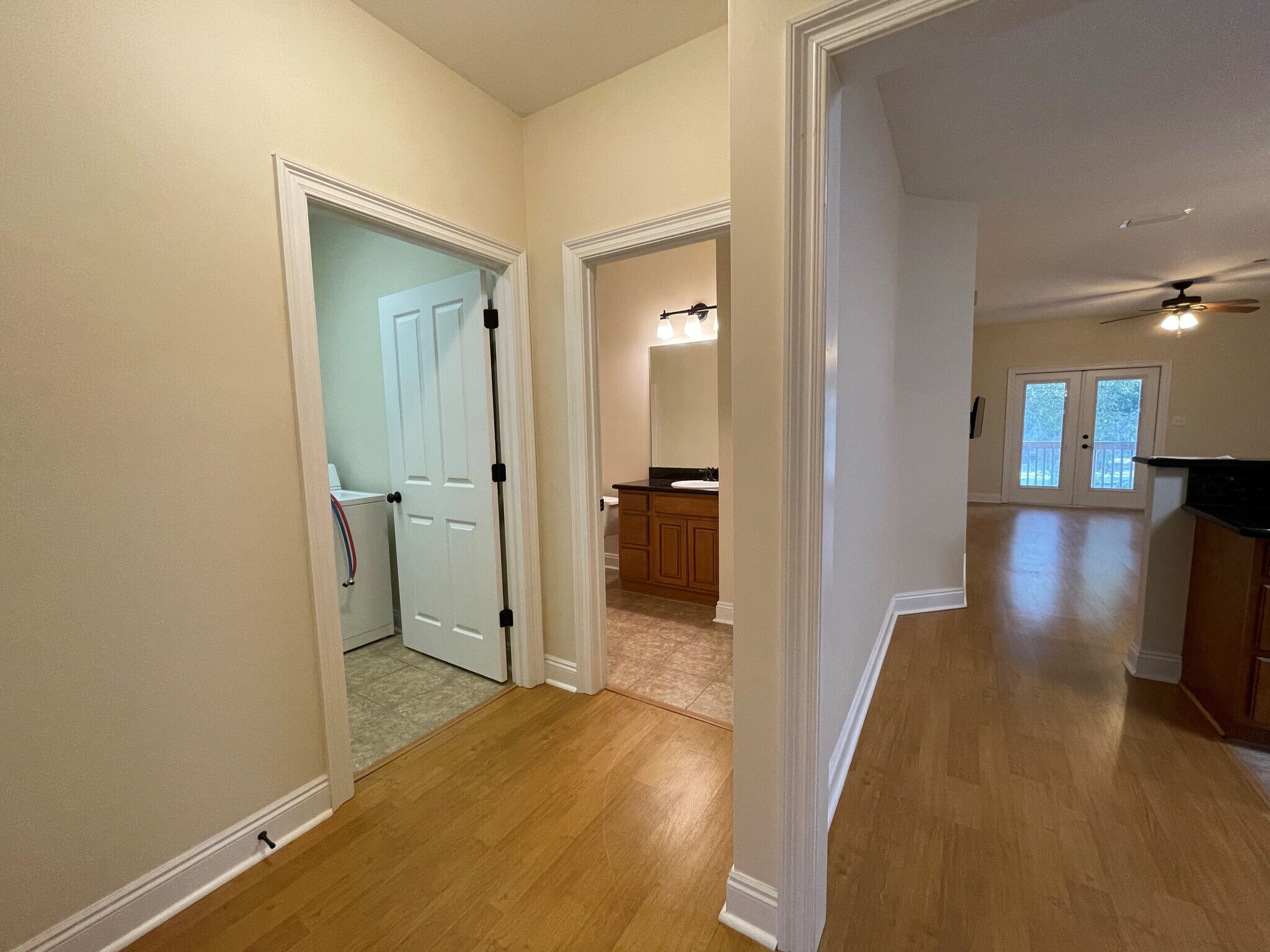 hall view of 2nd bath and laundry room - 20637 Blueberry Ln