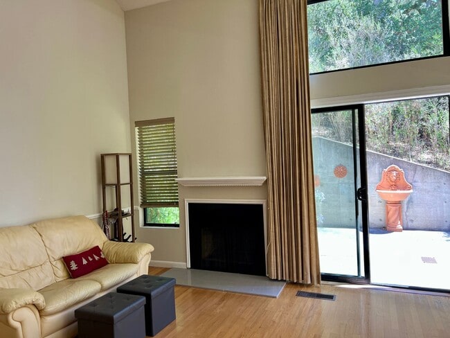 Building Photo - Great Natural light, Treetop Views with 2 Primary Suites plus OFFICE and a 2 car garage, It is li...