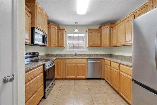 Building Photo - 10737 Sycamore Ridge Ln