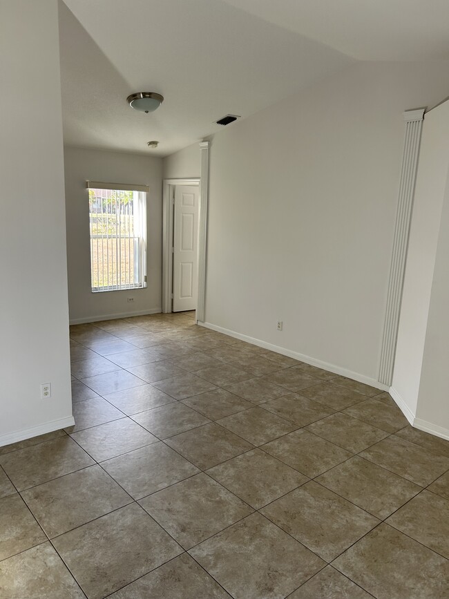 Building Photo - 6480 NW Volucia Dr