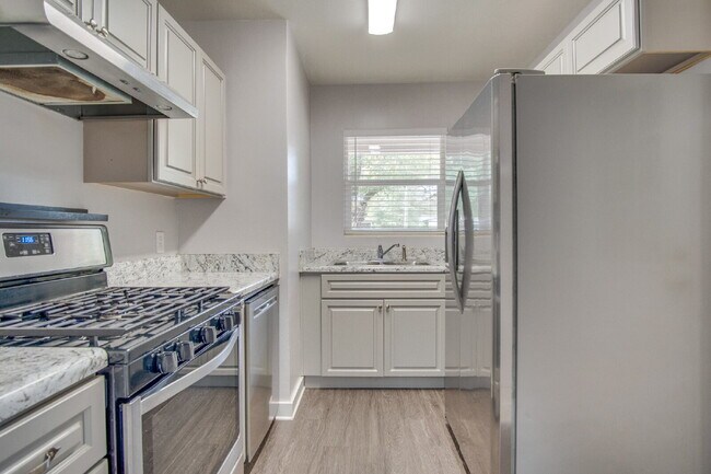 Building Photo - Updated 3-Bedroom, 2-Bath Ranch with Fenced Backyard, Carport, and Modern Kitchen