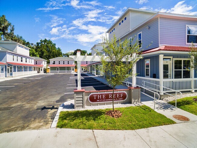 Building Photo - The Reef Townhome NOW LEASING FOR FALL 2026!