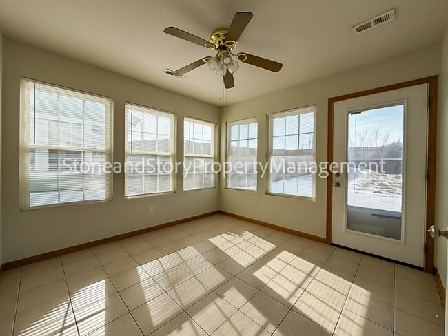 Building Photo - 2 bedroom 1.5 bath duplex with sunroom, 2 car garage and fenced yard