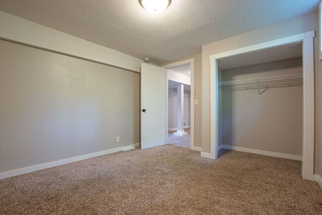 Building Photo - Adorable Brick 4 Bedroom Ranch with Finish...