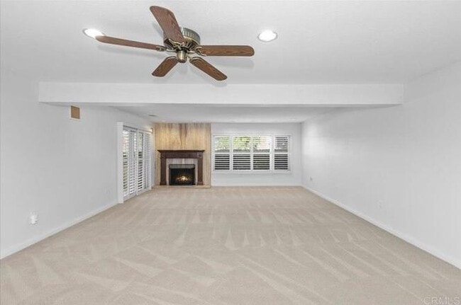 Building Photo - Poolside Living at Its Finest – Turnkey 3BR Condo with Direct Patio Access to the Pool