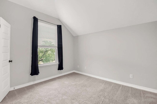 Building Photo - "Spacious 4-Bedroom Sanctuary with Cozy Fireplace in San Antonio's Prime Location!"