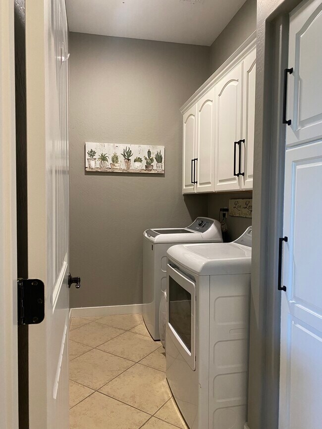 In-unit laundry room - 4241 N Pebble Creek Pky