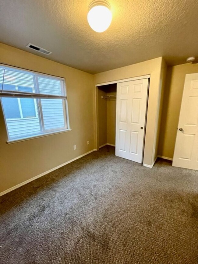 Building Photo - Single level home in Foxborough! Fenced yard!  A/C and a gas fireplace!