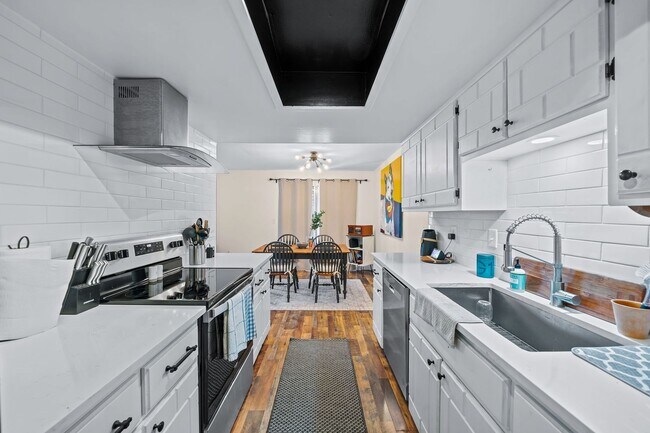 Building Photo - Recently Updated 2BA, 1.5BA Condo with Fen...