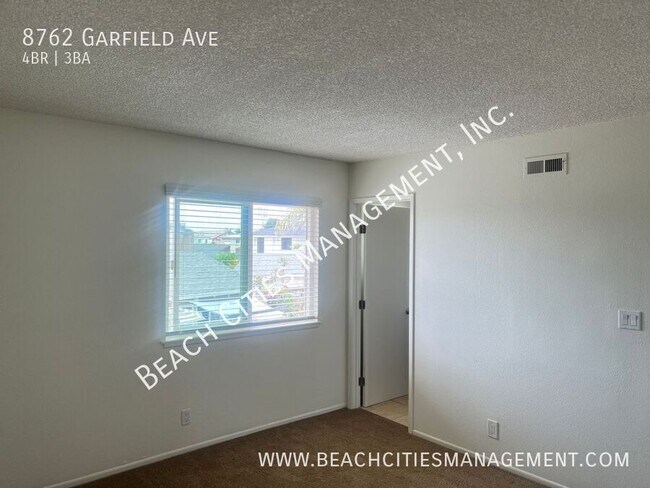 Building Photo - 8762 Garfield Ave