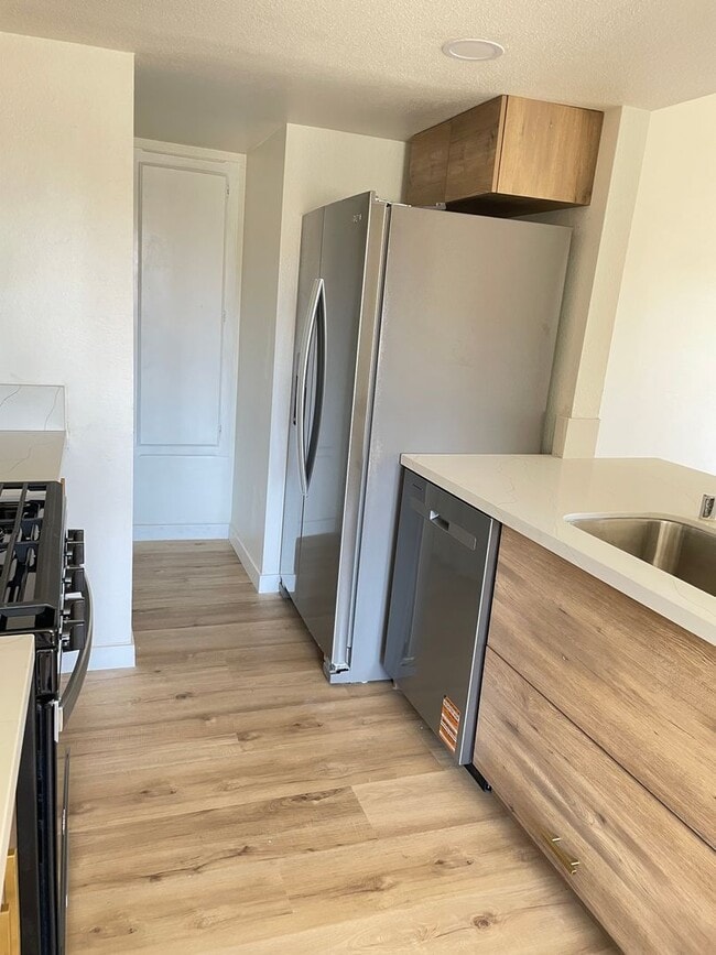 Building Photo - Stylish 3-Bedroom Retreat in the Highly De...