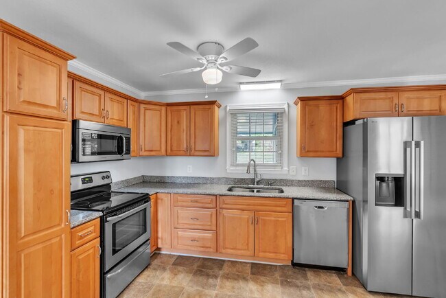 Building Photo - Spacious 3 Bedroom, 2 Bath Home with Dual Living Areas & Energy-Saving Solar Panels! $2000/mo rent