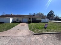 Building Photo - Cozy 2 bedroom, 1.5 bath, 1 car garage. Lawn care is included in the rent!! This is a NO PET PROP...