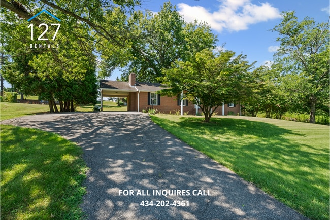 Building Photo - Spacious 4-Bedroom Home with Dual Kitchens...