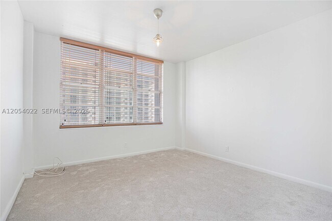 Building Photo - 5700 Collins Ave