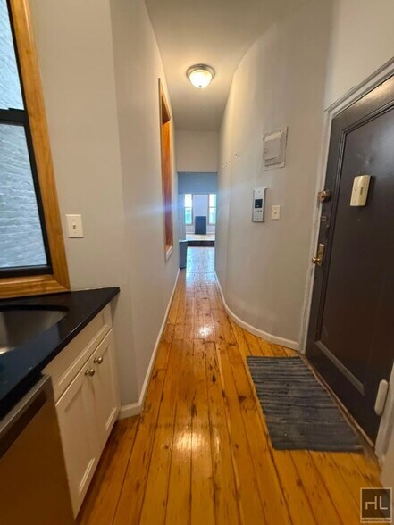 Building Photo - Classic East Village One-Bedroom with Exposed Brick & High Ceilings
