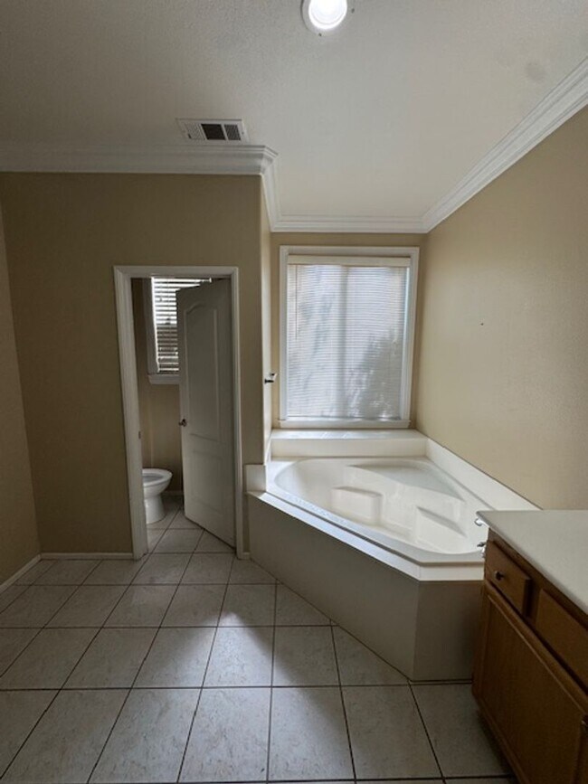 Building Photo - Experience comfort, security, and lifestyle all in one—this is 55+ living at its finest in Hemet!