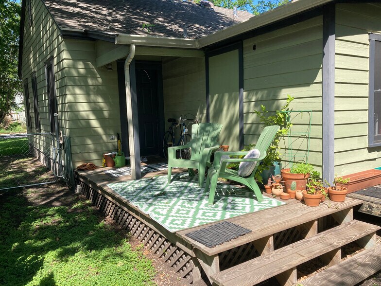 rear entry and deck, south side of house 4/21/21 - 1307 E 28th St