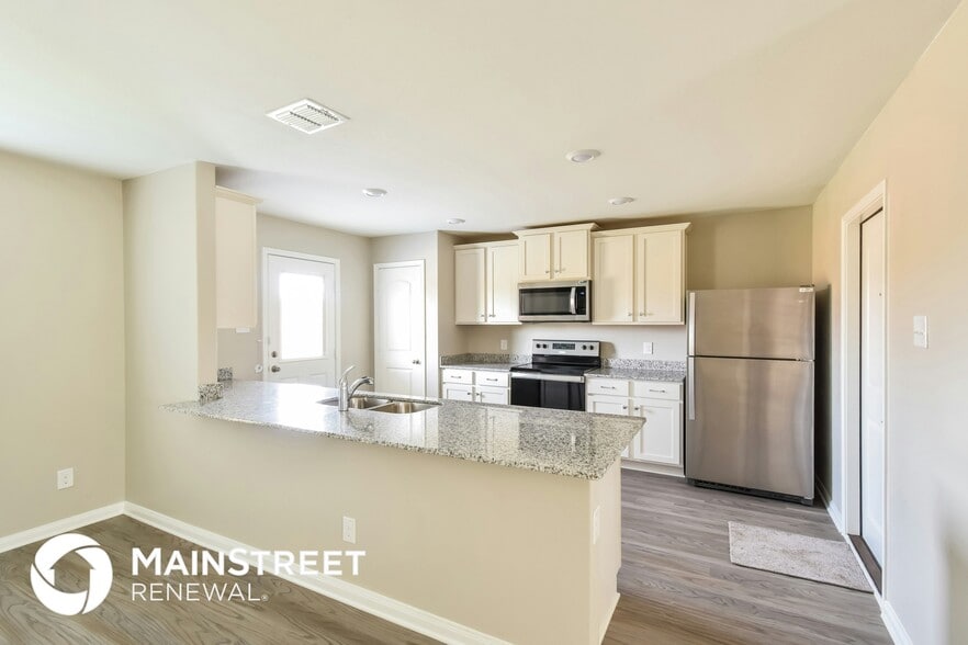 Building Photo - 3103 Begonia Bend