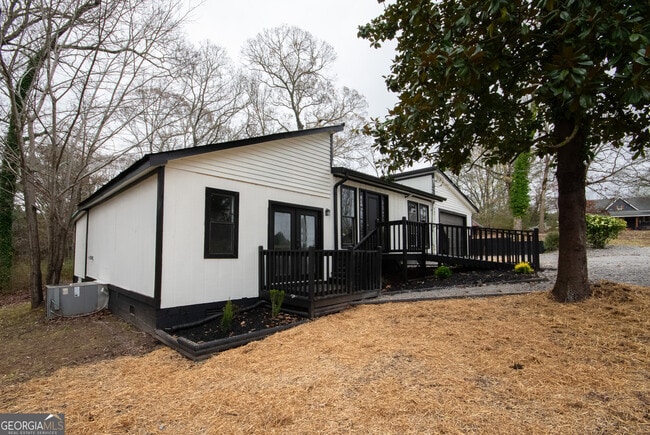 Building Photo - 7971 Roosterville Rd