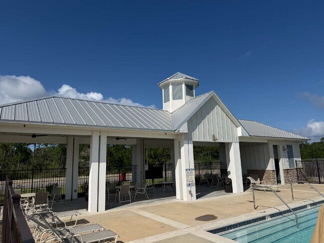 Building Photo - "Charming 4-Bed Oasis with Granite Touches in Gulf Breeze – Electricity Included   !"