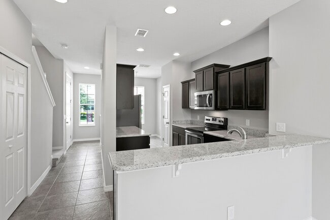 Building Photo - 4/2.5 Beautiful Energy Efficient Townhome in St. Cloud
