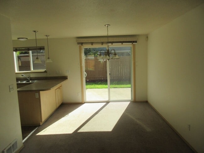 Building Photo - Large Three Bedroom Home, Landscaping Prov...